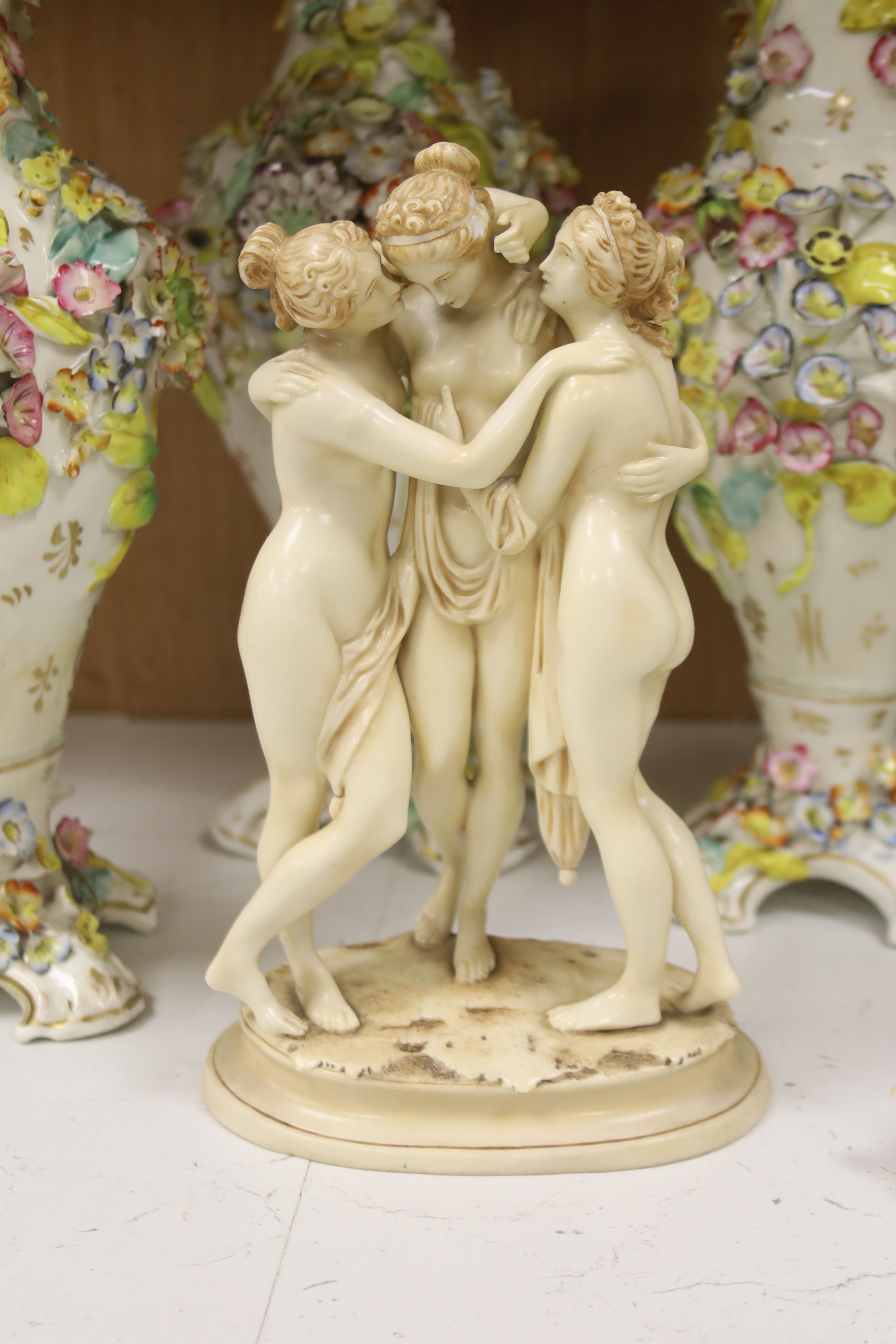 A set of three Victorian Coalbrookdale type vases, a Continental Three Graces group and sundry ceramics, tallest 34cm